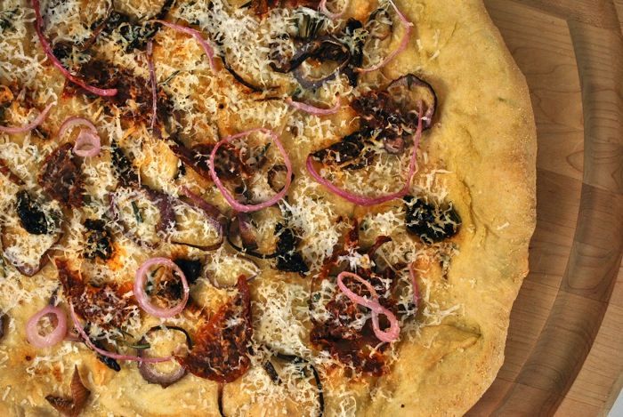 focaccia with onions, sun-dried tomatoes, and pecorino