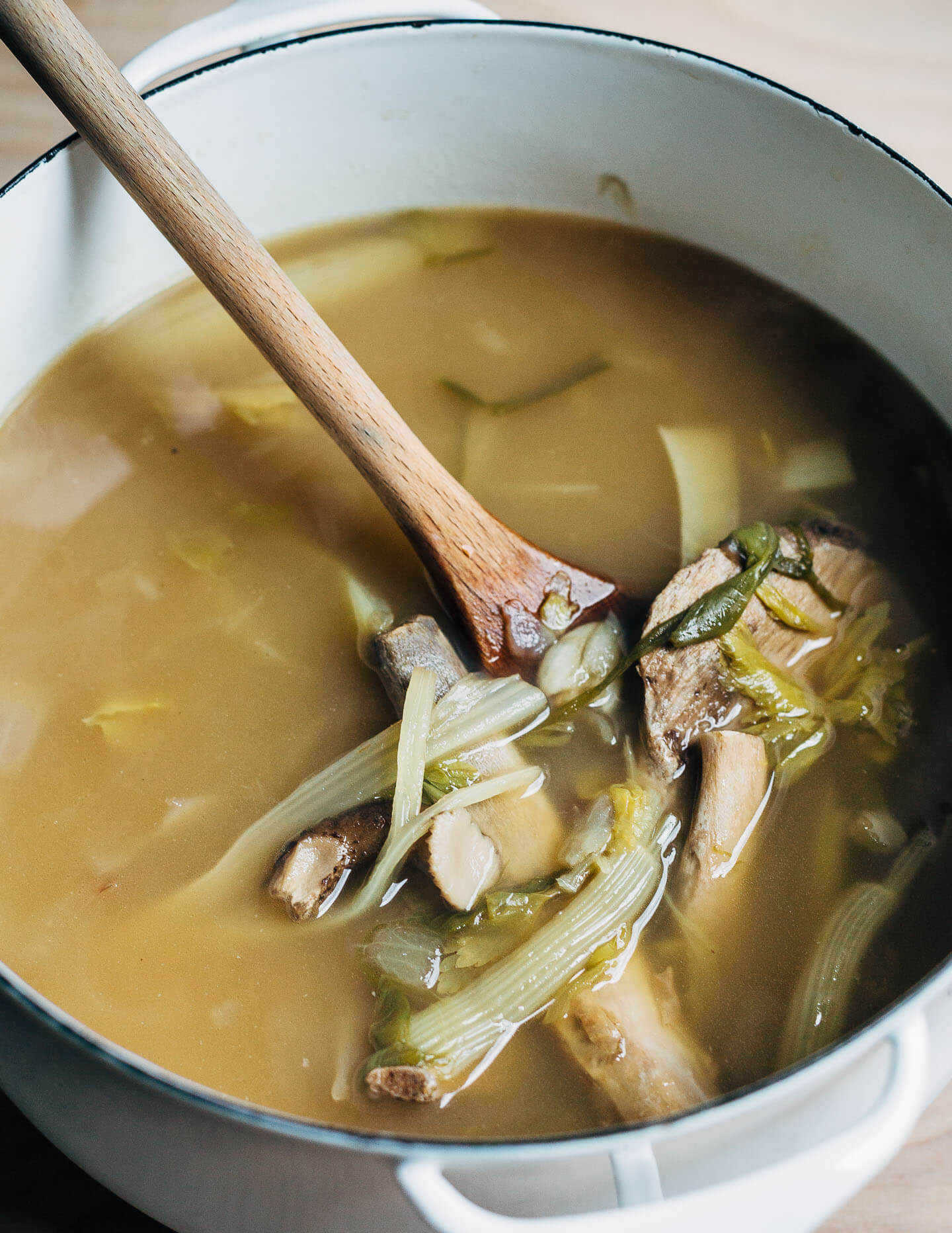 Pork bone broth with onions, leeks, garlic, and ginger. 