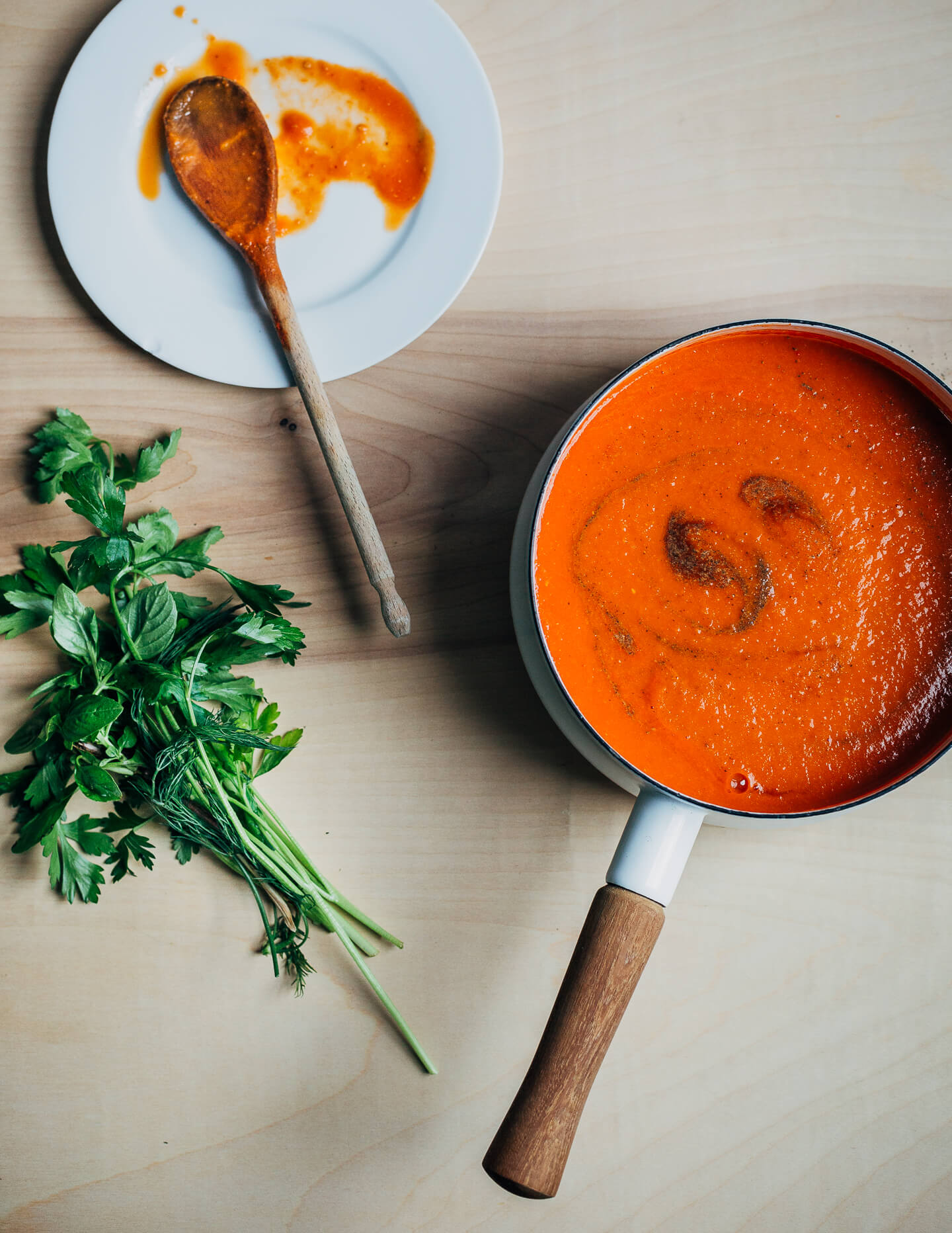 Roasted tomato soup warming in a pot. 