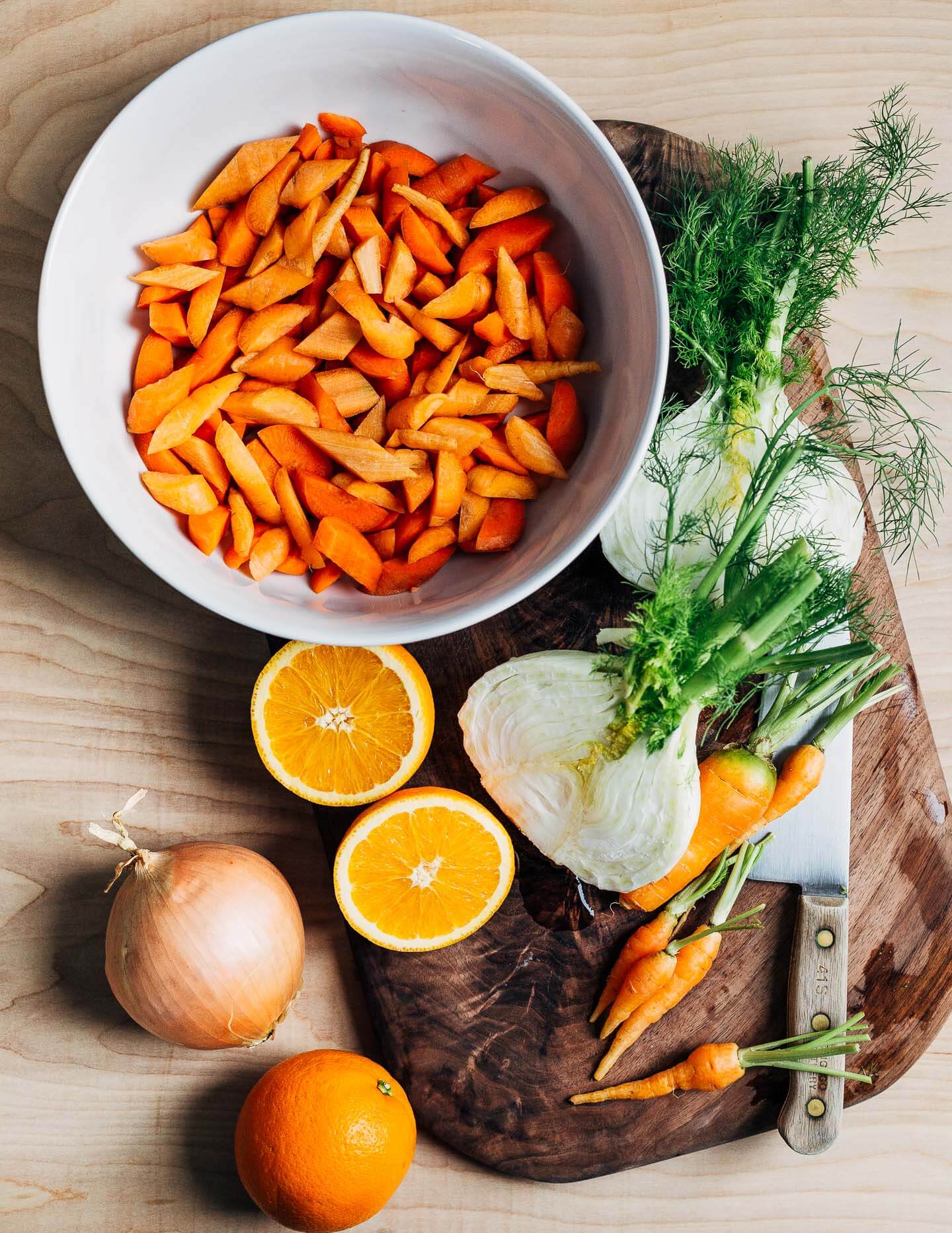 Ingredients for carrot and fennel soup with orange. 