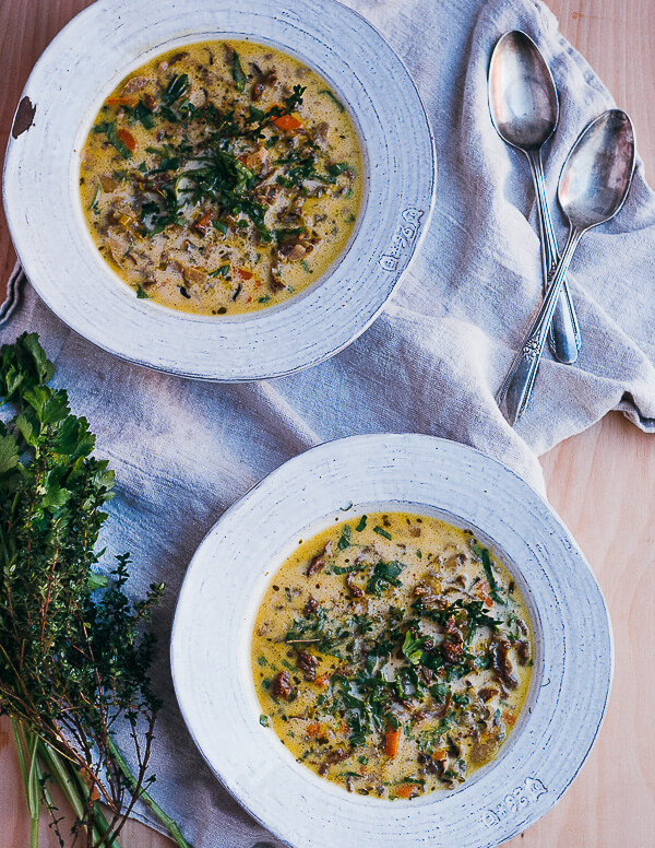 Two bowls of soup on a table