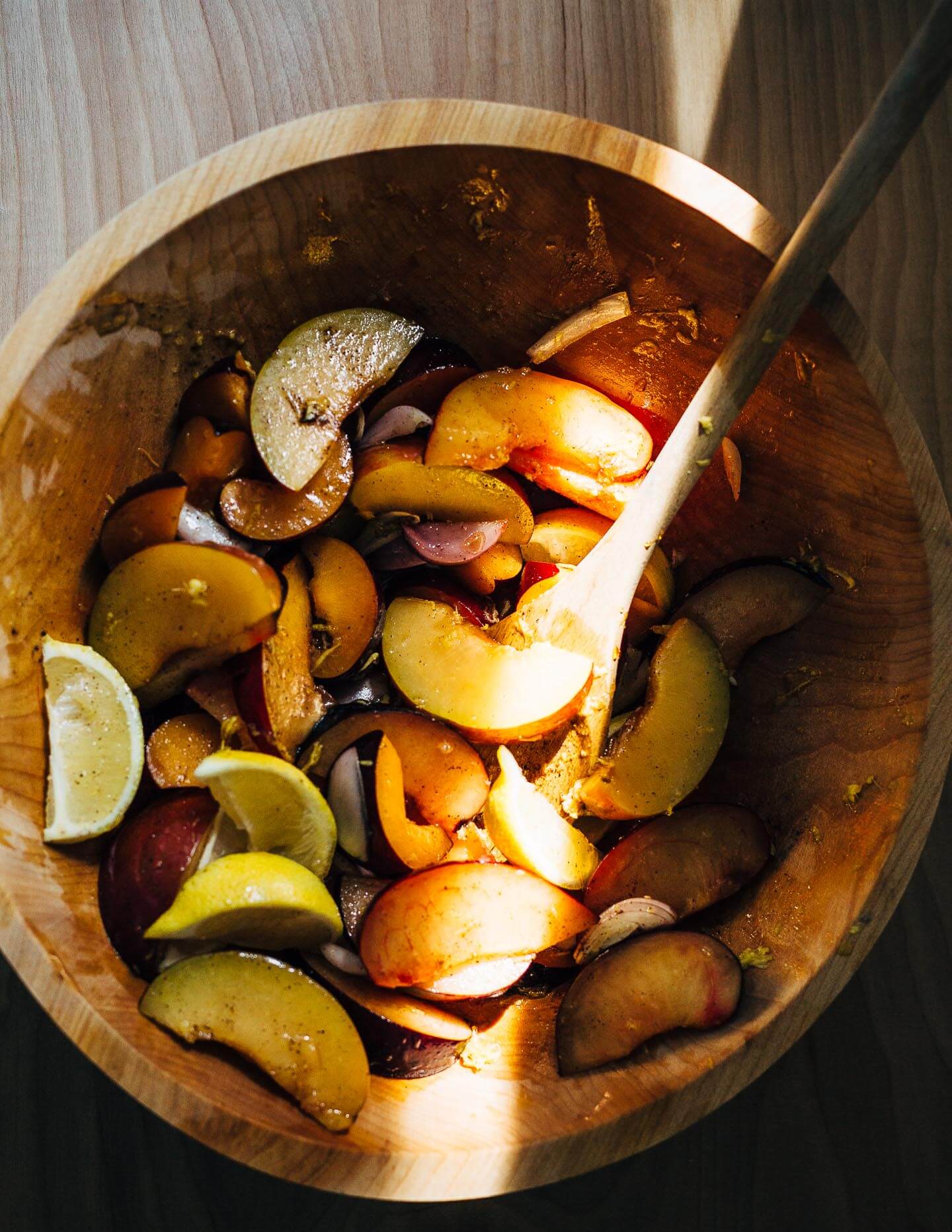 A simple sheet pan chicken and plums recipe featuring crispy saffron- and garlic-infused chicken topped with a sweet and savory plum pan sauce.