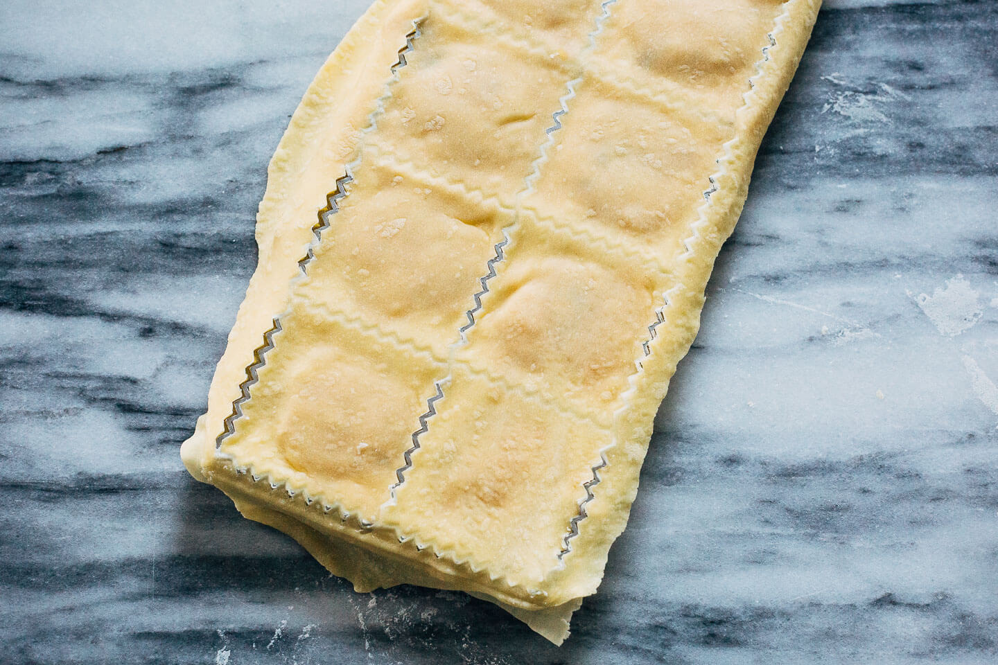 A fall-perfect recipe for roasted kabocha squash ravioli with Parmesan and thyme.