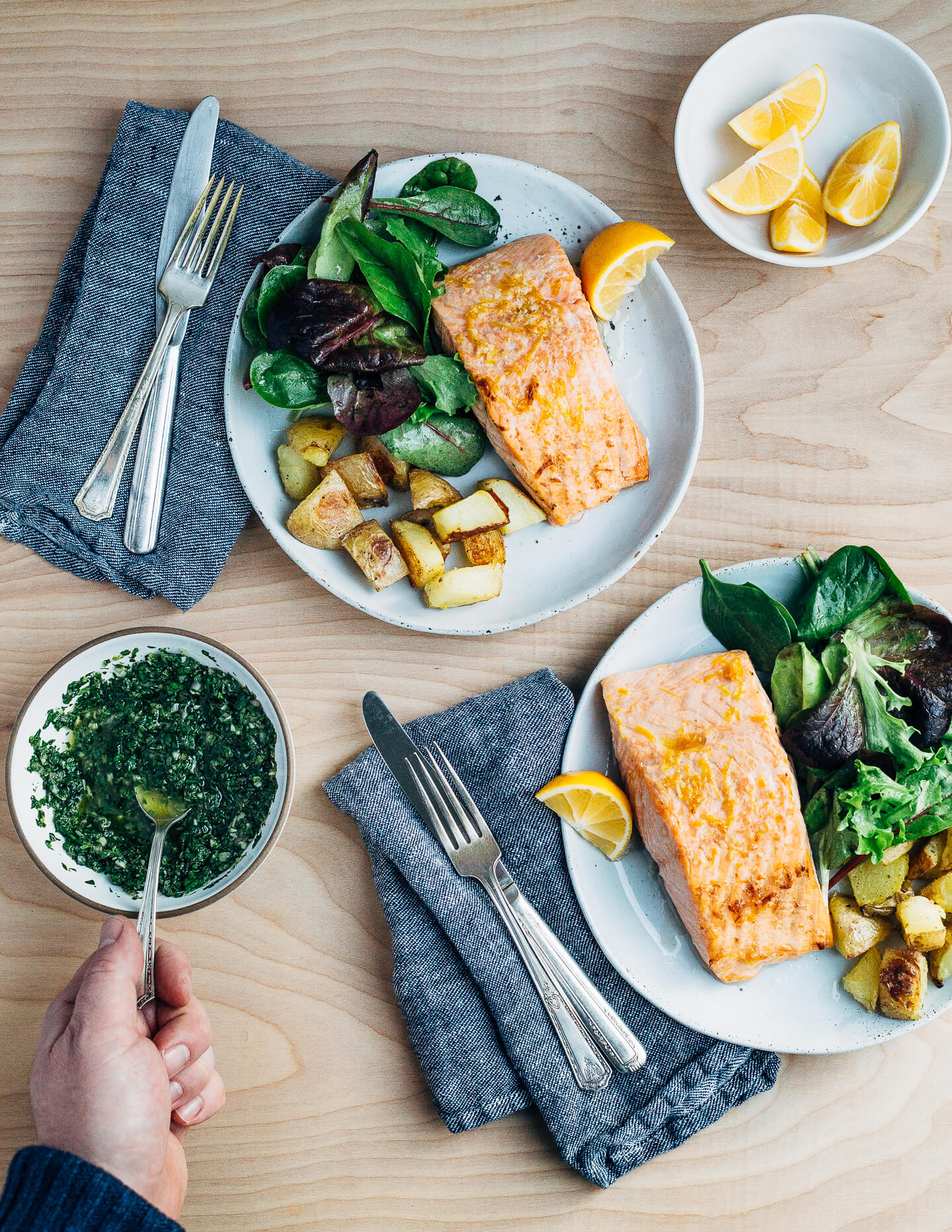 Broiled salmon fillets with a vibrant Meyer lemon and mint chimichurri makes for a simple, yet elevated mid-winter meal that's perfect for a Valentine's dinner at home. 
