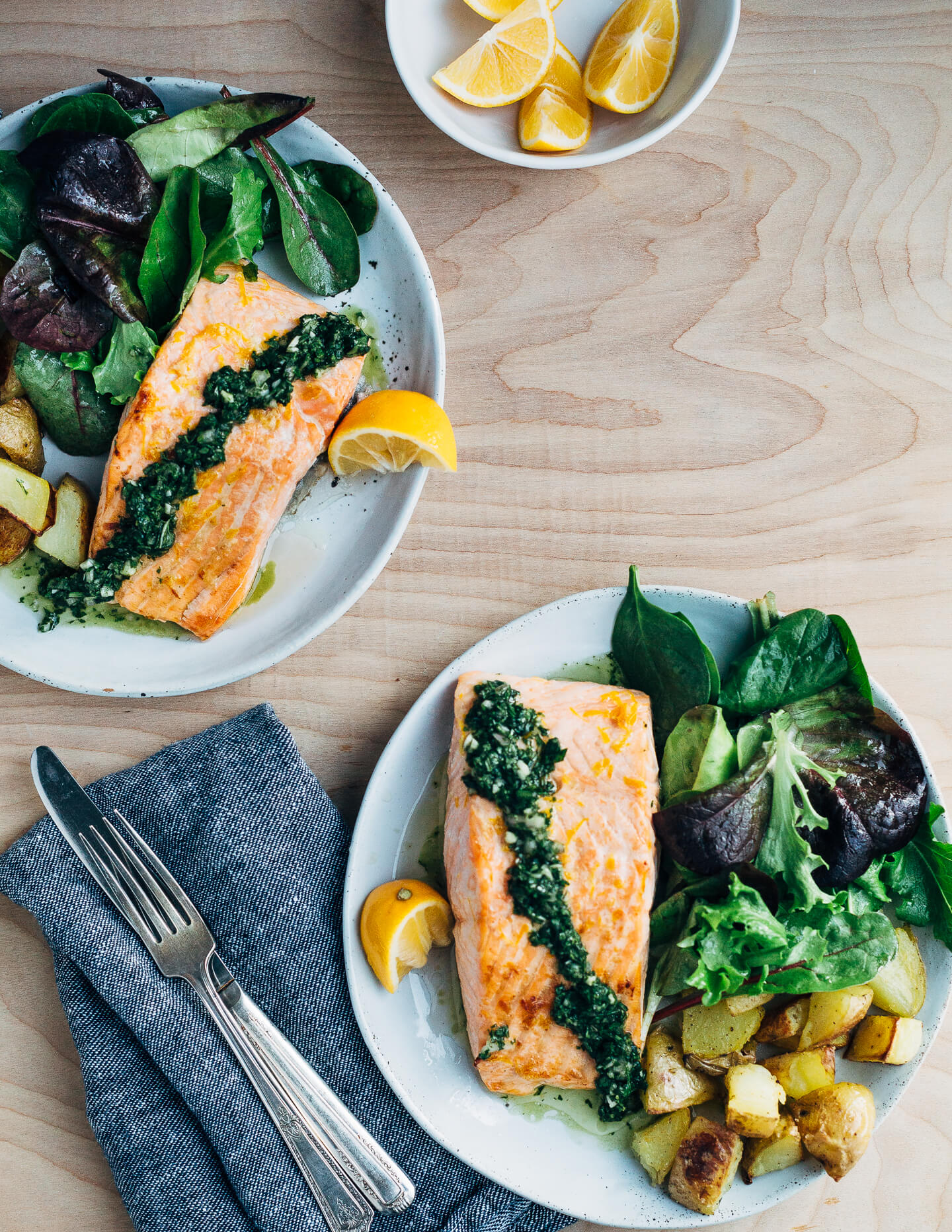 Broiled salmon fillets with a vibrant Meyer lemon and mint chimichurri makes for a simple, yet elevated mid-winter meal that's perfect for a Valentine's dinner at home. 