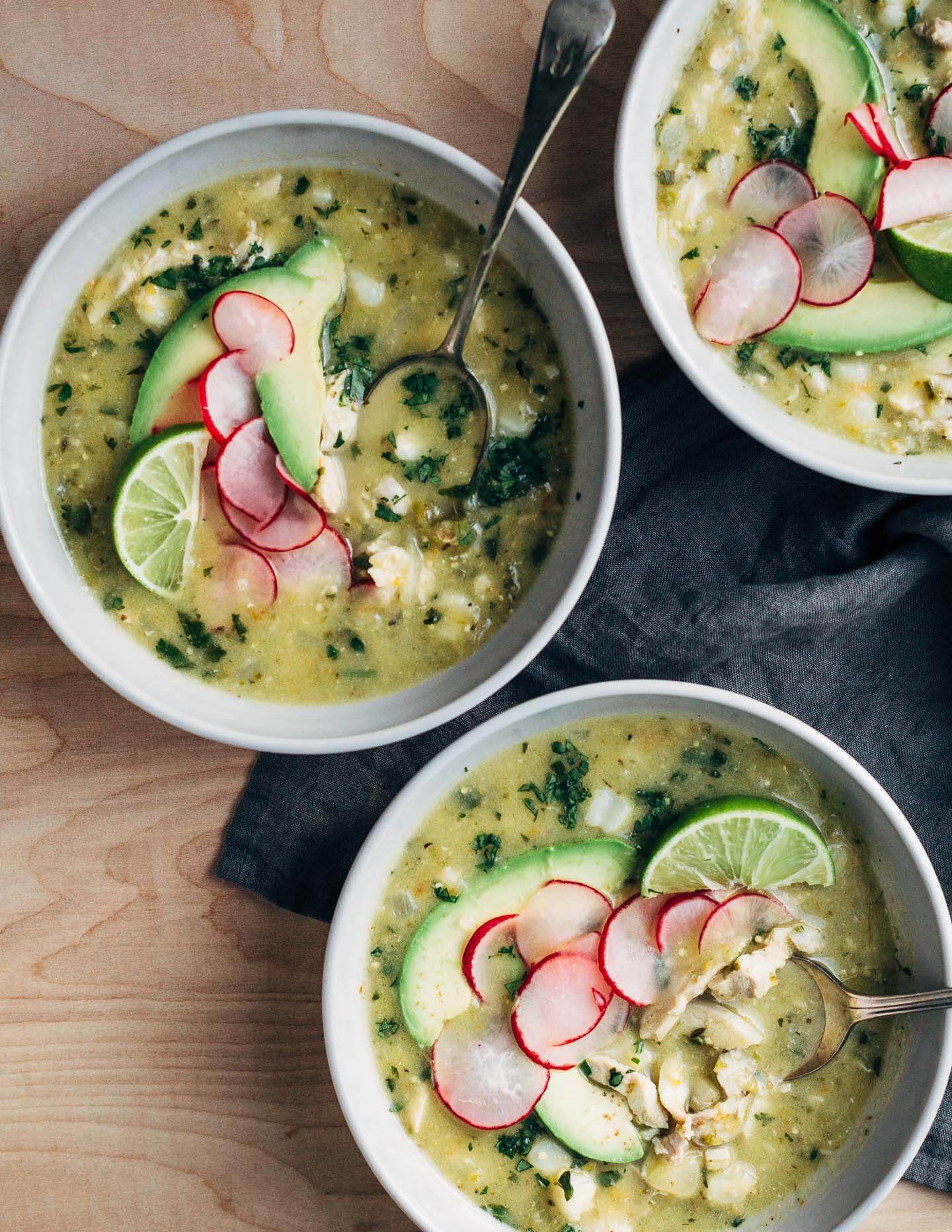 A fortifying mix of rich chicken broth, tender shredded chicken, chewy corn hominy, and tart tomatillos make this chicken pozole verde the ideal dish to see you through the end of winter (and cold season).