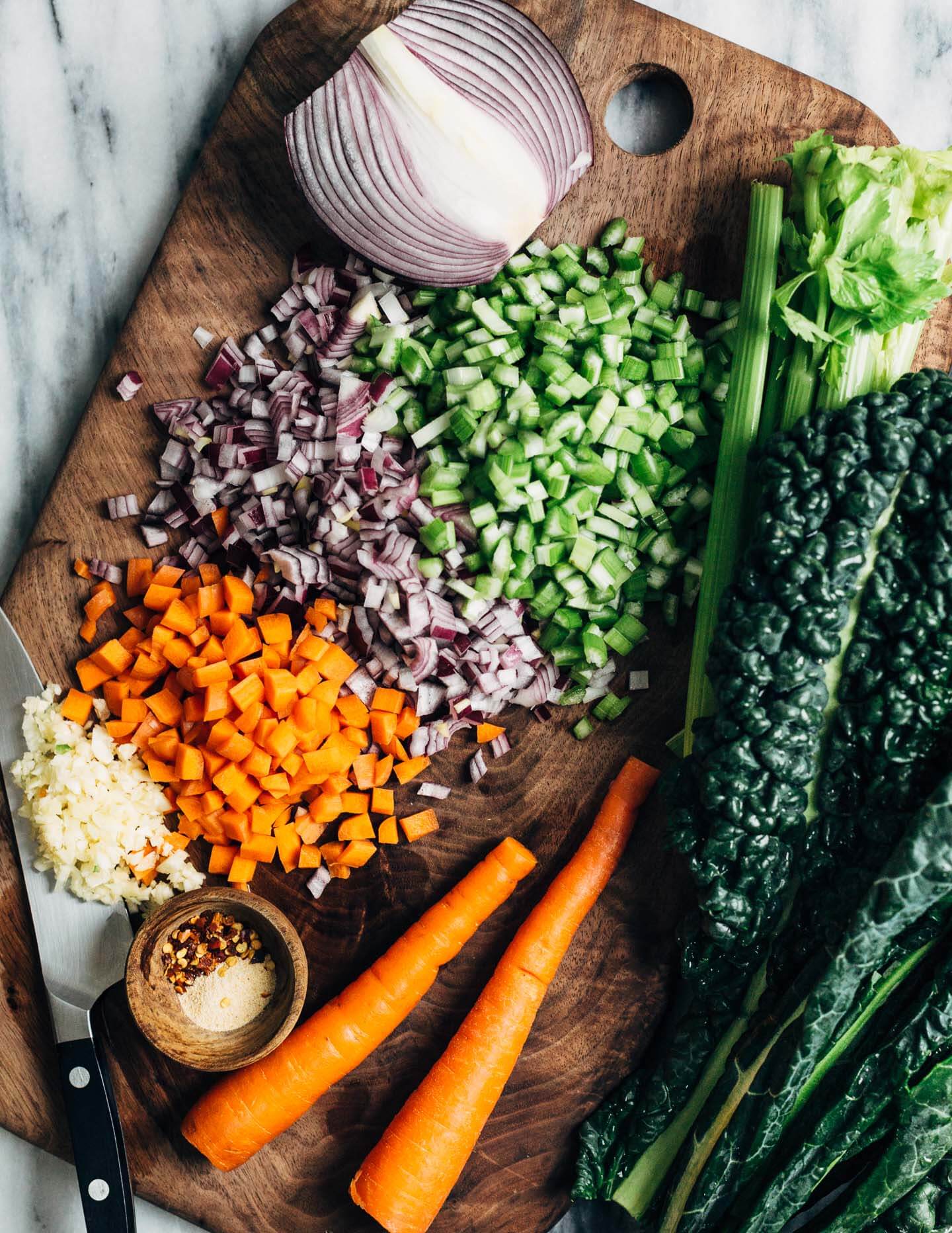 A meal-worthy vegan vegetable pasta soup with a little bit of everything: delicious vegetable broth, fire-roasted tomatoes, kale, carrots, thyme, and toothsome pasta.