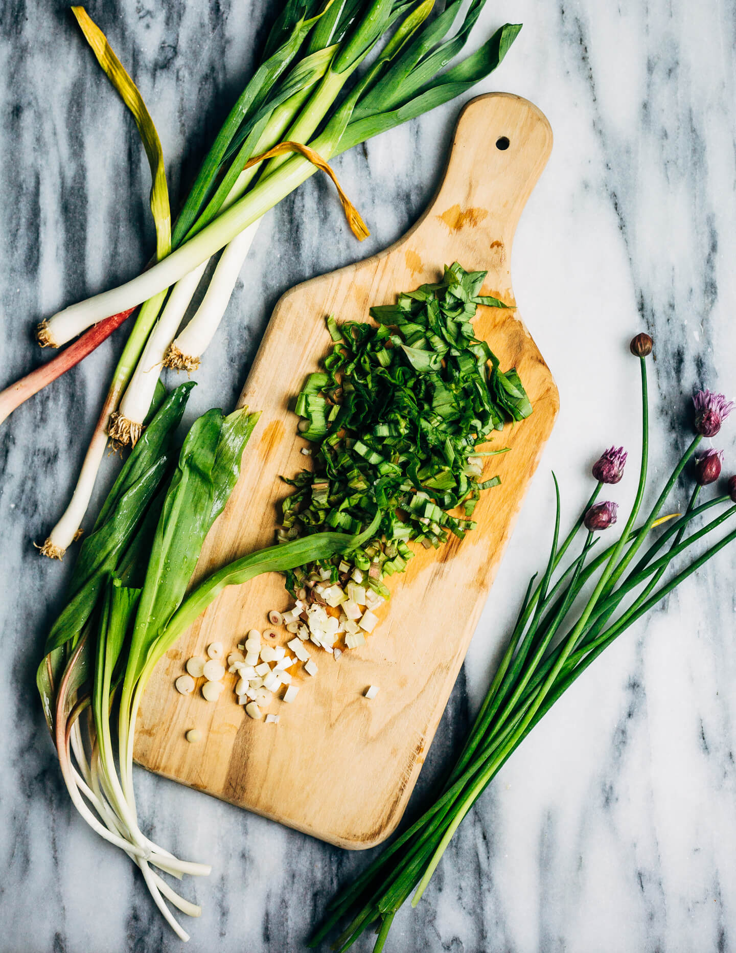 Ideal for Mother's Day brunch or spring gatherings, this sheet pan spinach quiche, made with ramps, green garlic, and chives, is a delicious way to feed a crowd.