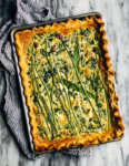 Ideal for Mother's Day brunch or spring gatherings, this sheet pan spinach quiche, made with ramps, green garlic, and chives, is a delicious way to feed a crowd.