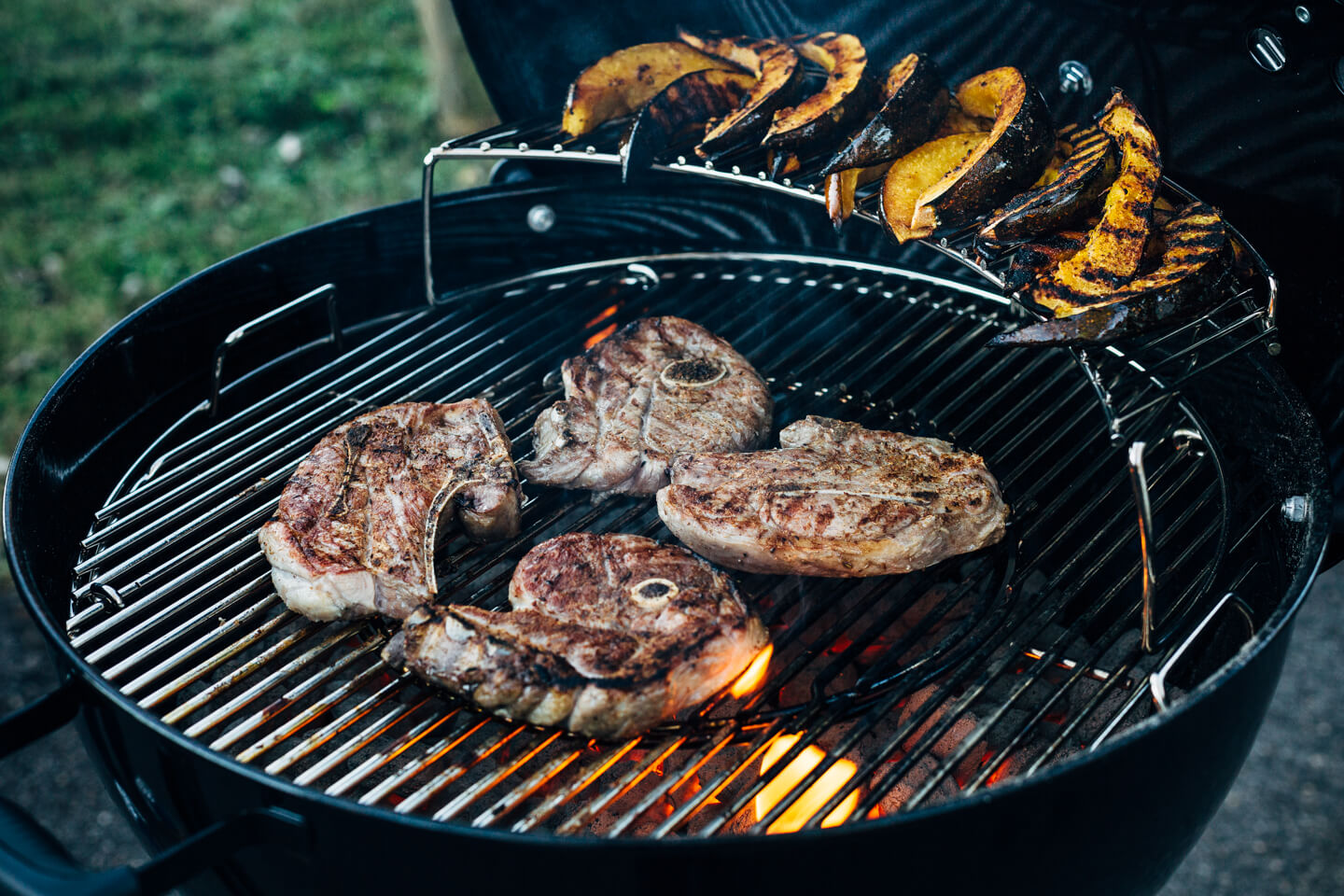 Add a pop of char and smoke to your Thanksgiving feast with this recipe for cumin-rubbed grilled lamb chops, grilled acorn squash wedges, dill and fennel tzatziki, and pomegranate arils. 