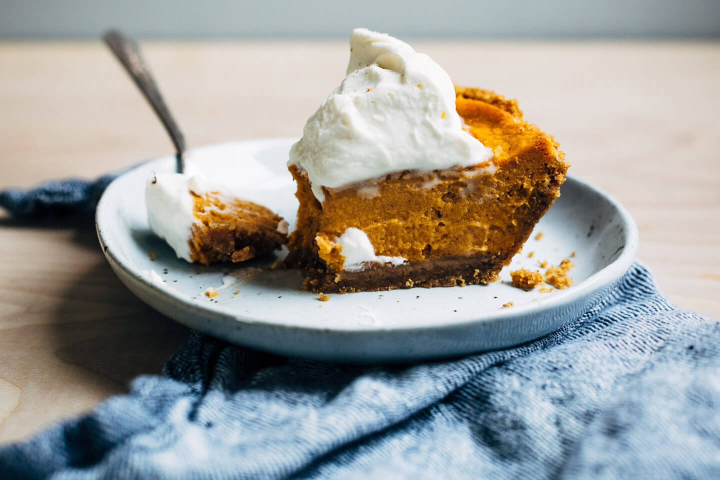 End your Thanksgiving feast with this light and silky bourbon-spiked sweet potato pie baked in a classic graham cracker crust and topped with a big dollop of brown sugar whipped cream. 