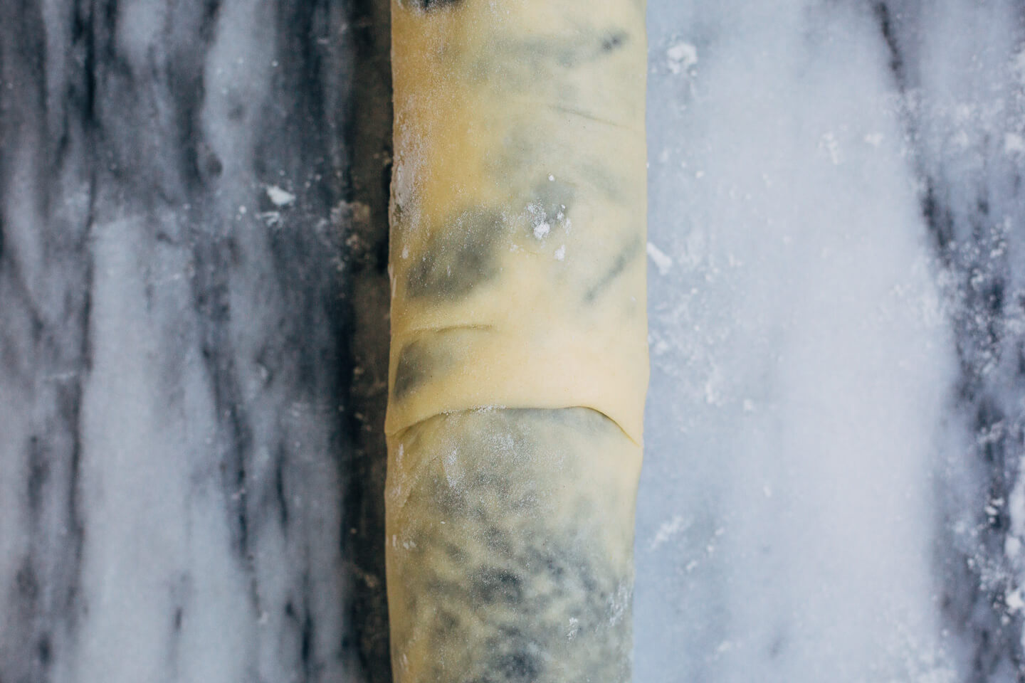 A sweet and pillowy yeasted twist bread recipe with nutty swirls of black sesame paste, from A Common Table by Cynthia Chen McTernan.