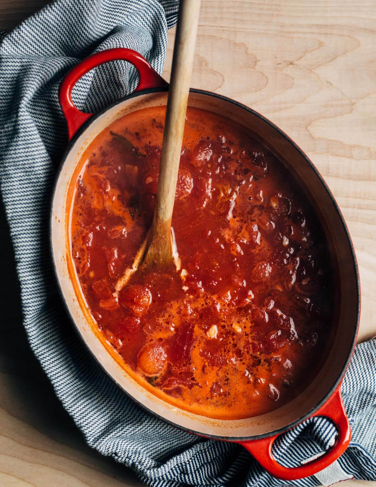 A simple tomato soup with poached eggs that can be as easy or as complex as you'd like. This one has harissa for heat and a little crunch from pickled onions. Golden, garlicky croutons are extra, but so delicious.