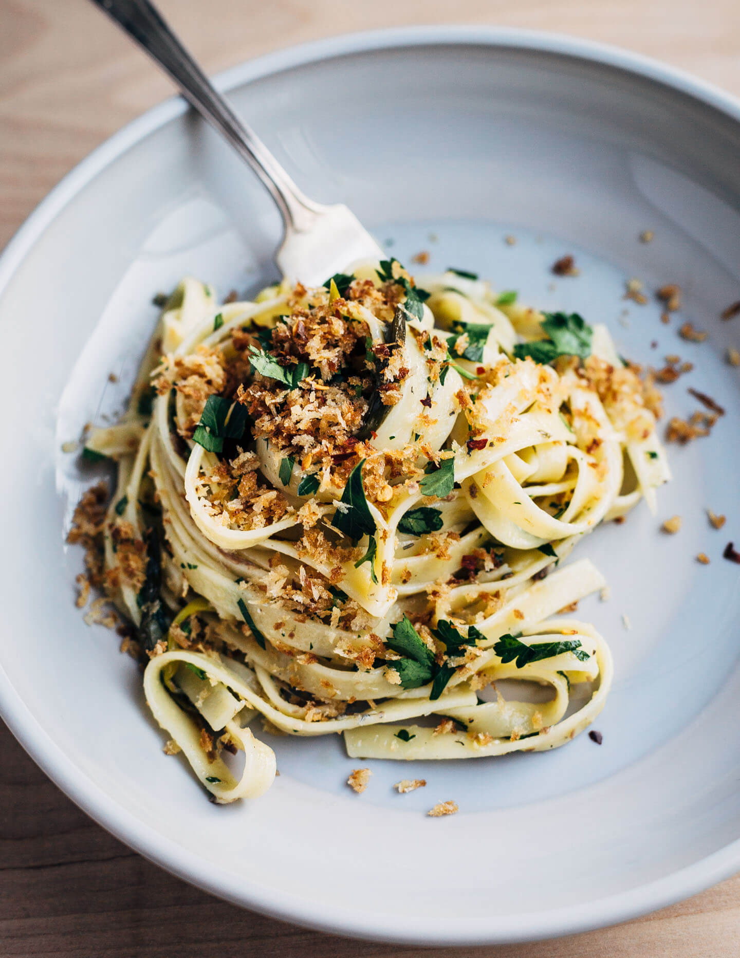 A hearty dish for early spring that's at once briny, rich, and herbaceous. Fettuccine noodles are tossed with delicate roasted spring onions, capers, herbs, tinned sardines, and buttery panko for a meal that's deeply satisfying. 