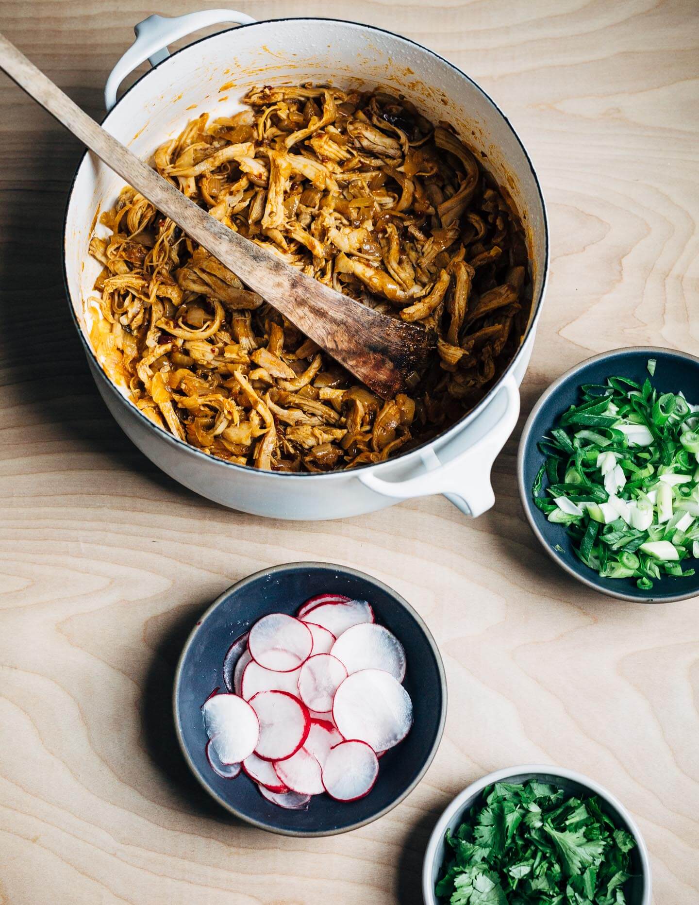 Chipotle chilies in adobo sauce lend smoky heat to these classic chicken tacos topped with avocado, radish, cilantro, and crumbled cotija. This post was created in partnership with SVO Farmer Focus Chicken. 