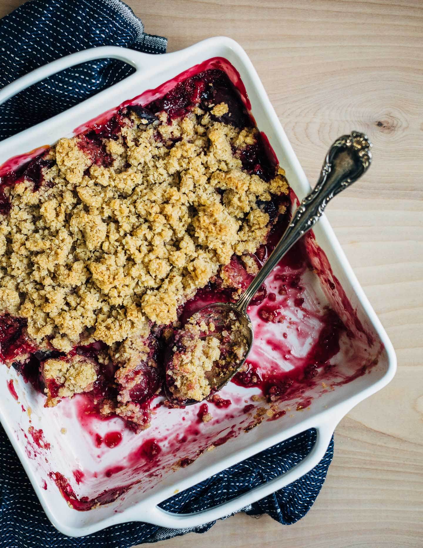 Gluten-free plum crisp made with an oat flour topping.
