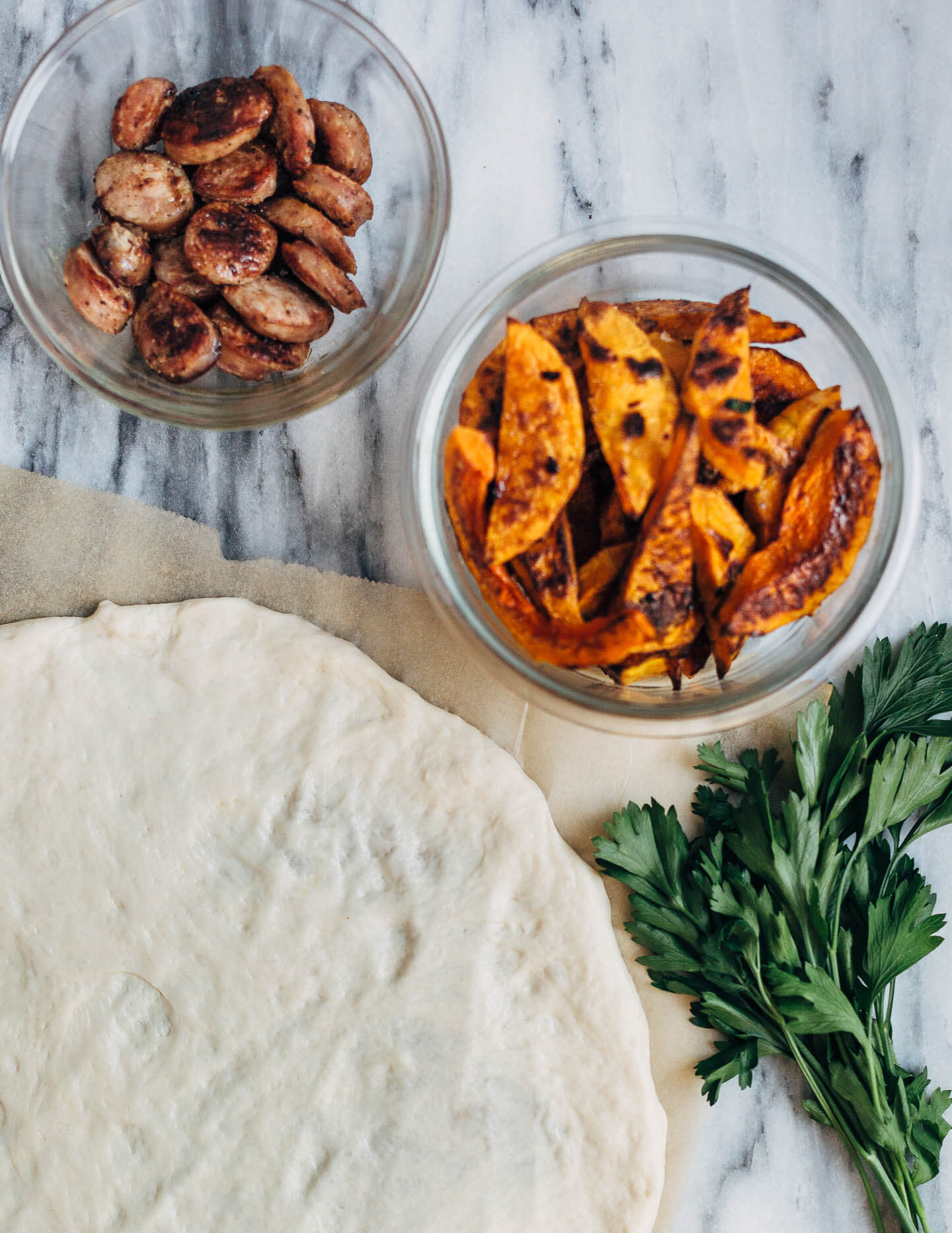 Roasted butternut squash and sausage pizza prep. 