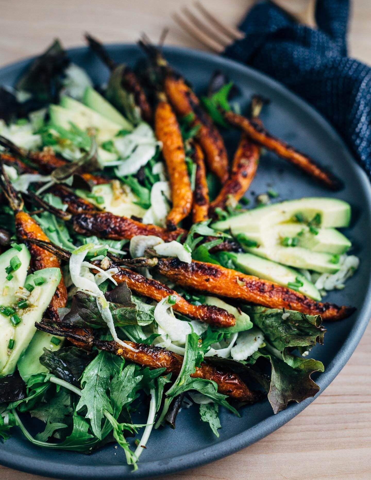 An autumnal shaved fennel and roasted carrot salad with toasted cumin-lime vinaigrette.