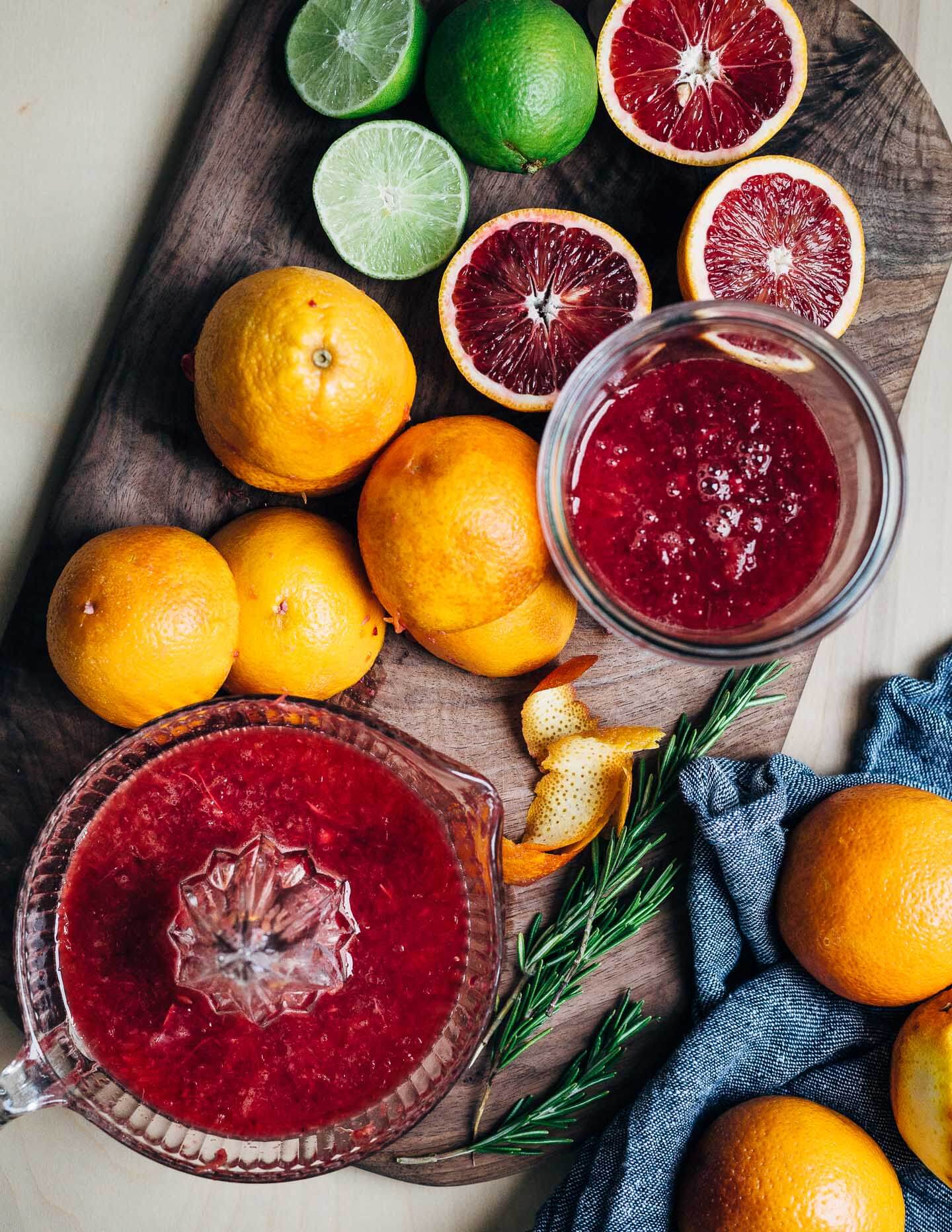 Juicing blood oranges.