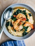 Shrimp and grits and greens, ready to serve.