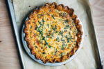 A vegetarian chive and cheddar quiche, just out of the oven.