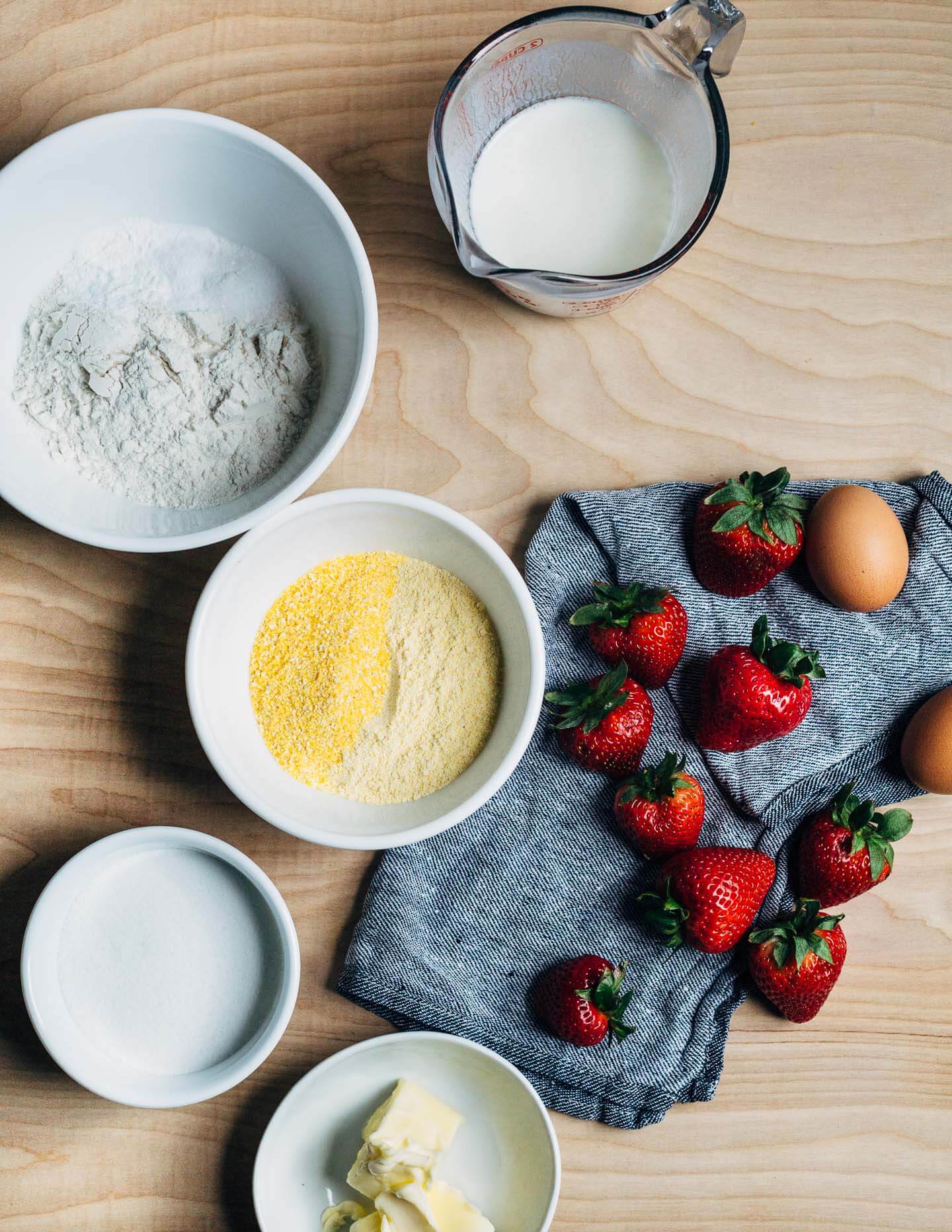 Ingredients for strawberry cornmeal cake. 