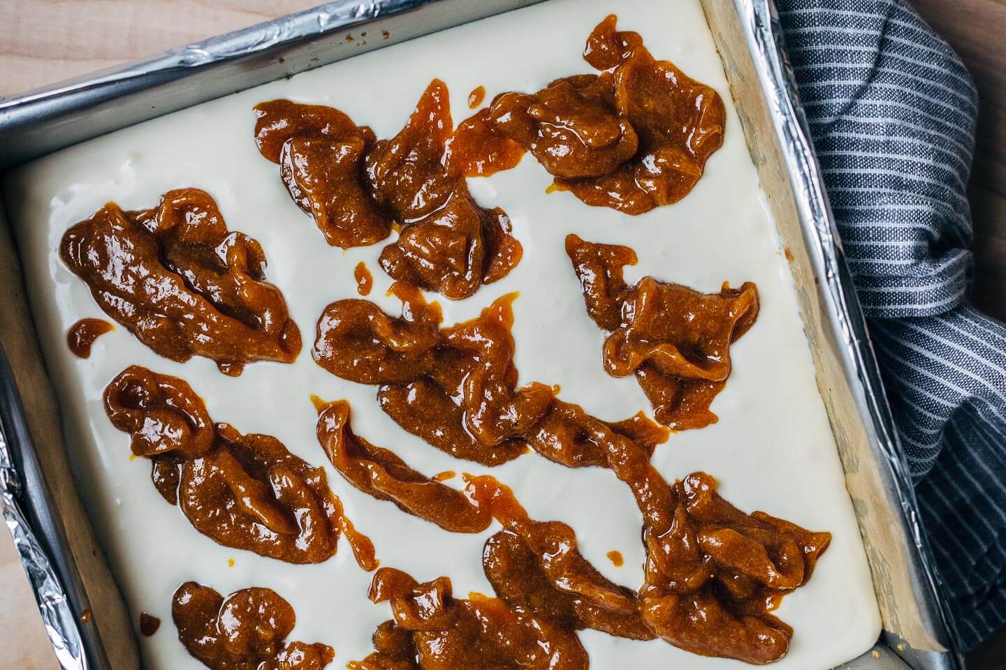 Making Sarah Kieffer’s Pumpkin Pie Cream Cheese bars from 100 Cookies.
