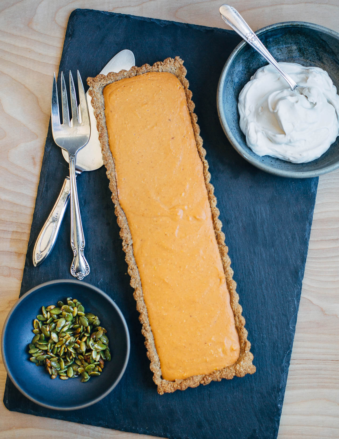 Sweet potato tart, with whipped maple coconut cream and salty-sweet pepitas. 