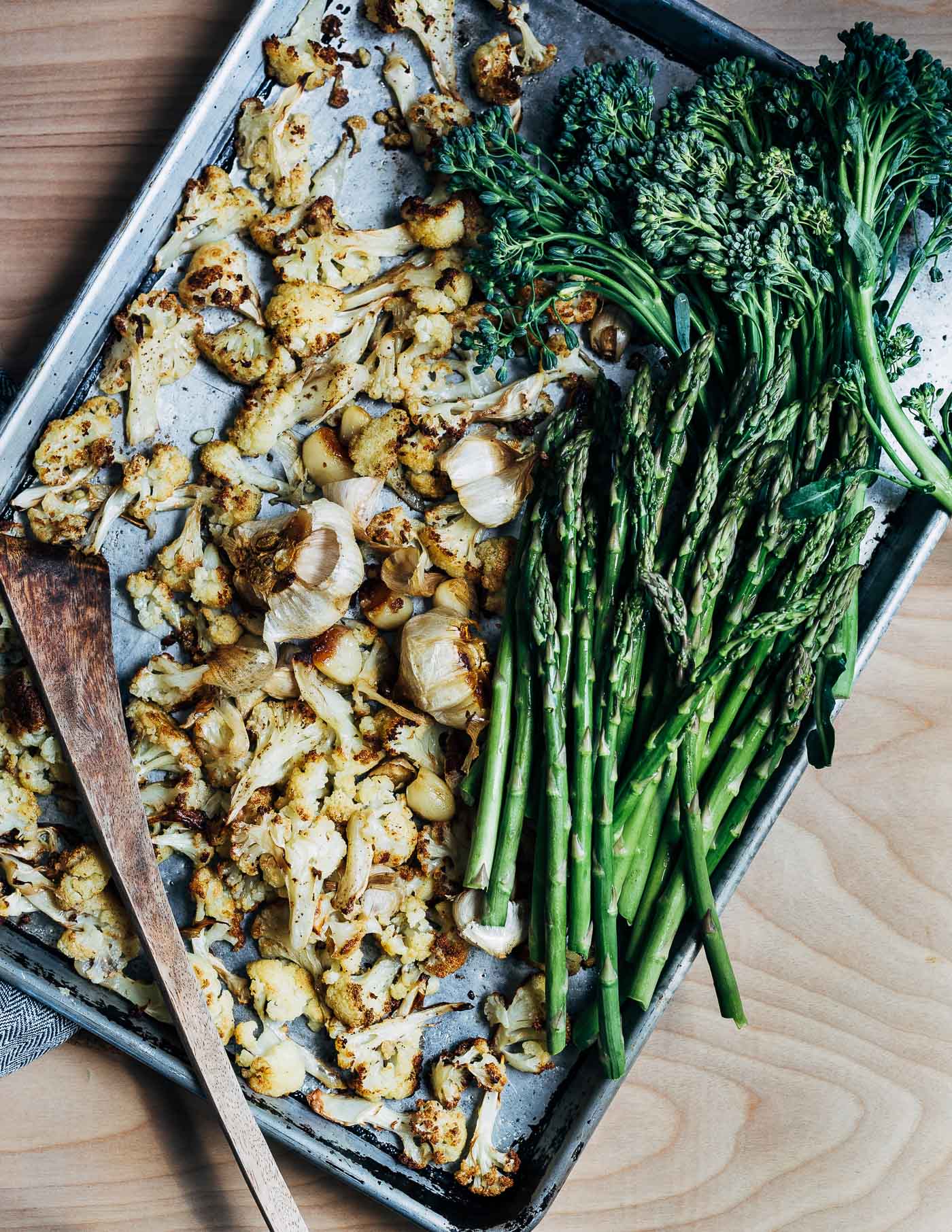 Roasted cauliflower and garlic, with fresh asparagus and broccolini.
