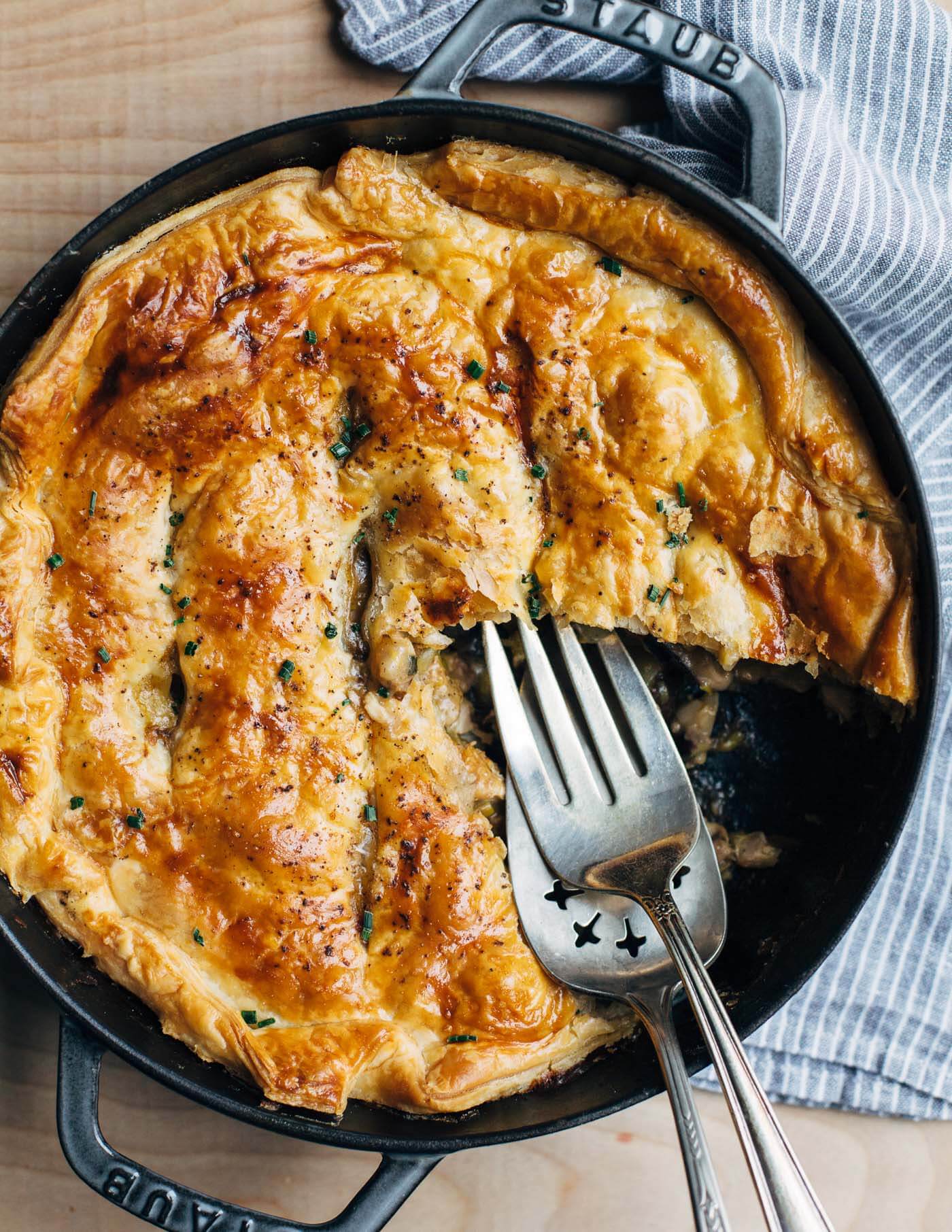 A comforting mushroom and leek chicken pot pie recipe for early spring. The recipe makes full use of chicken thighs’ rich flavors, first by cooking the vegetables in rendered chicken fat, and then by gently poaching the thighs and making a flavorful chicken broth for the filling.