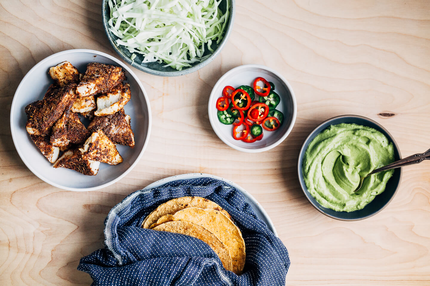 Fixings for baked fish tacos. 