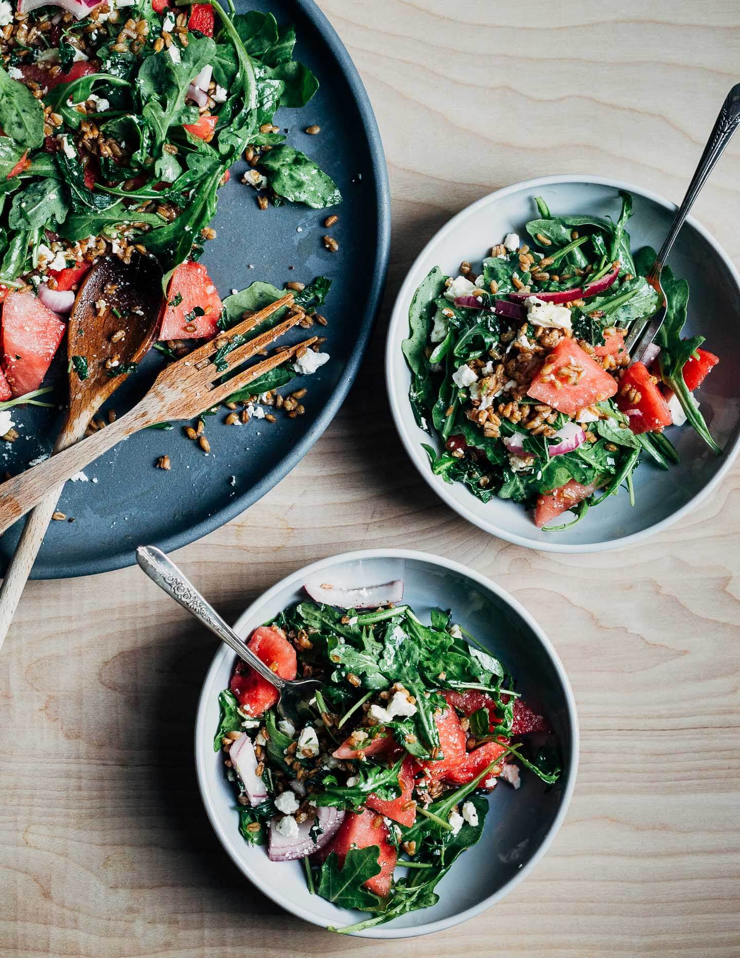 Nutty fried farro and lemony pickled red onions lend savory depth to this spin on the classic watermelon feta salad.