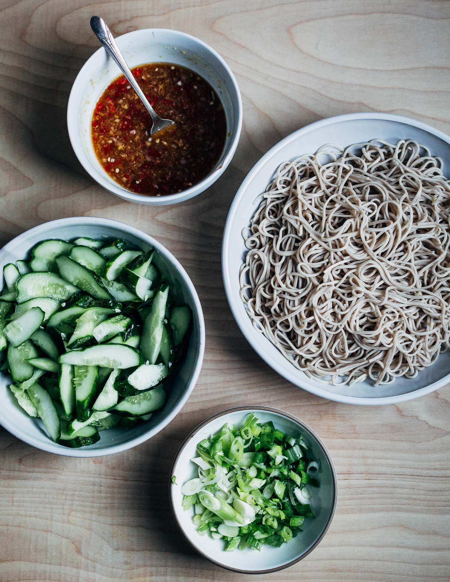 Soba noodles, sweet chili sauce, cucumbers, and green onions. 