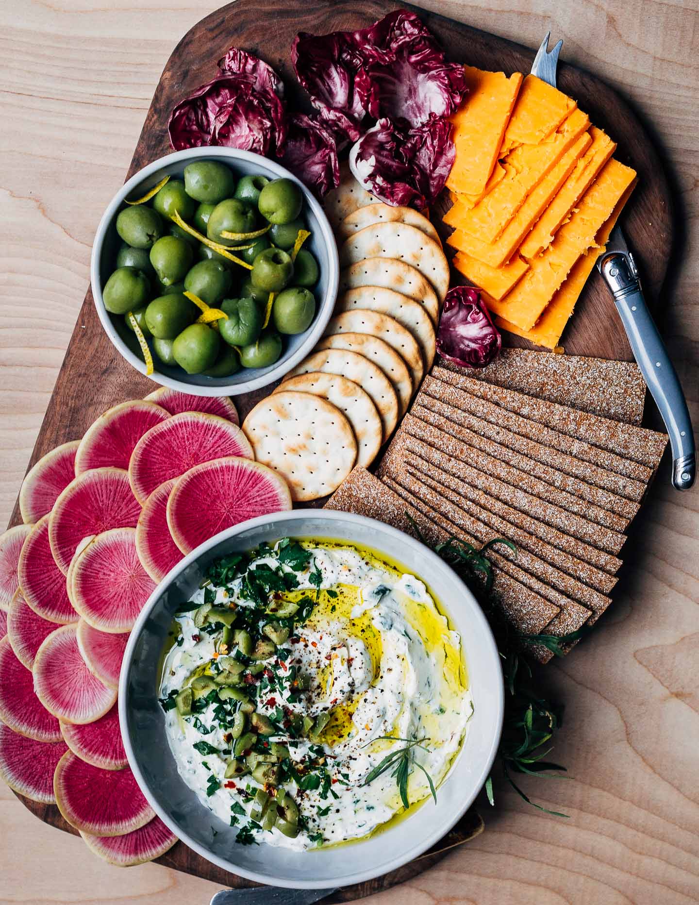 Don't forget the appetizers! This light, tangy whipped goat cheese dip is a lovely addition to a festive holiday snack board. This delicious chèvre dip comes together in minutes and can be made up to 3 days ahead of time.