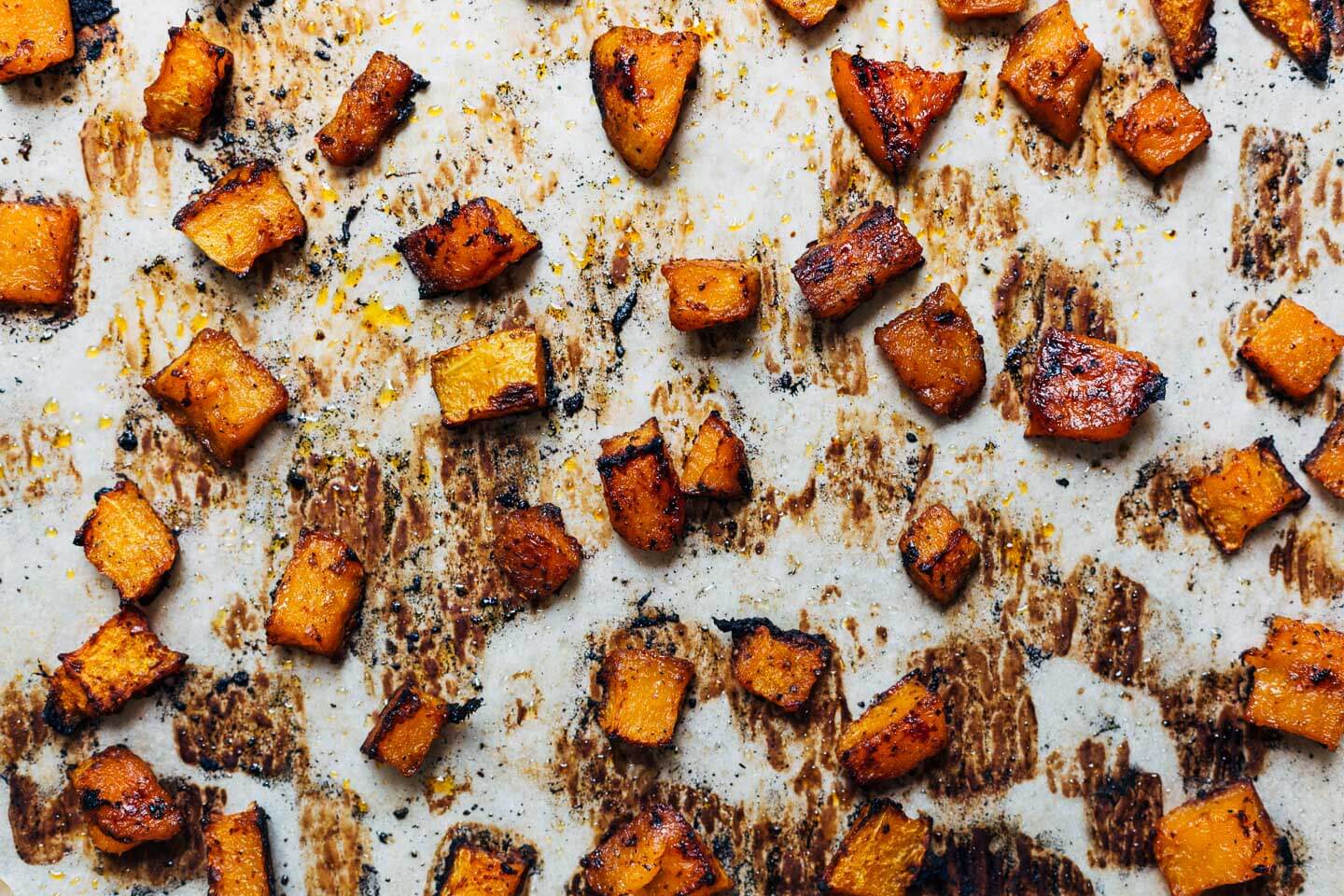 Roasted butternut squash on a baking sheet. 