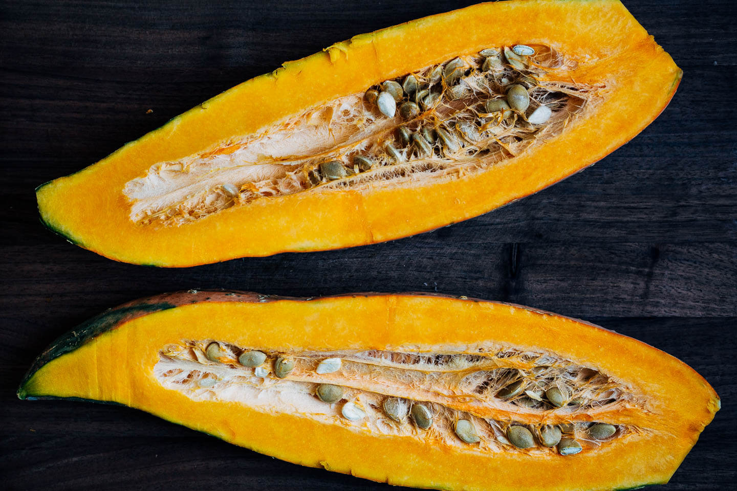 A halved candy roaster squash
