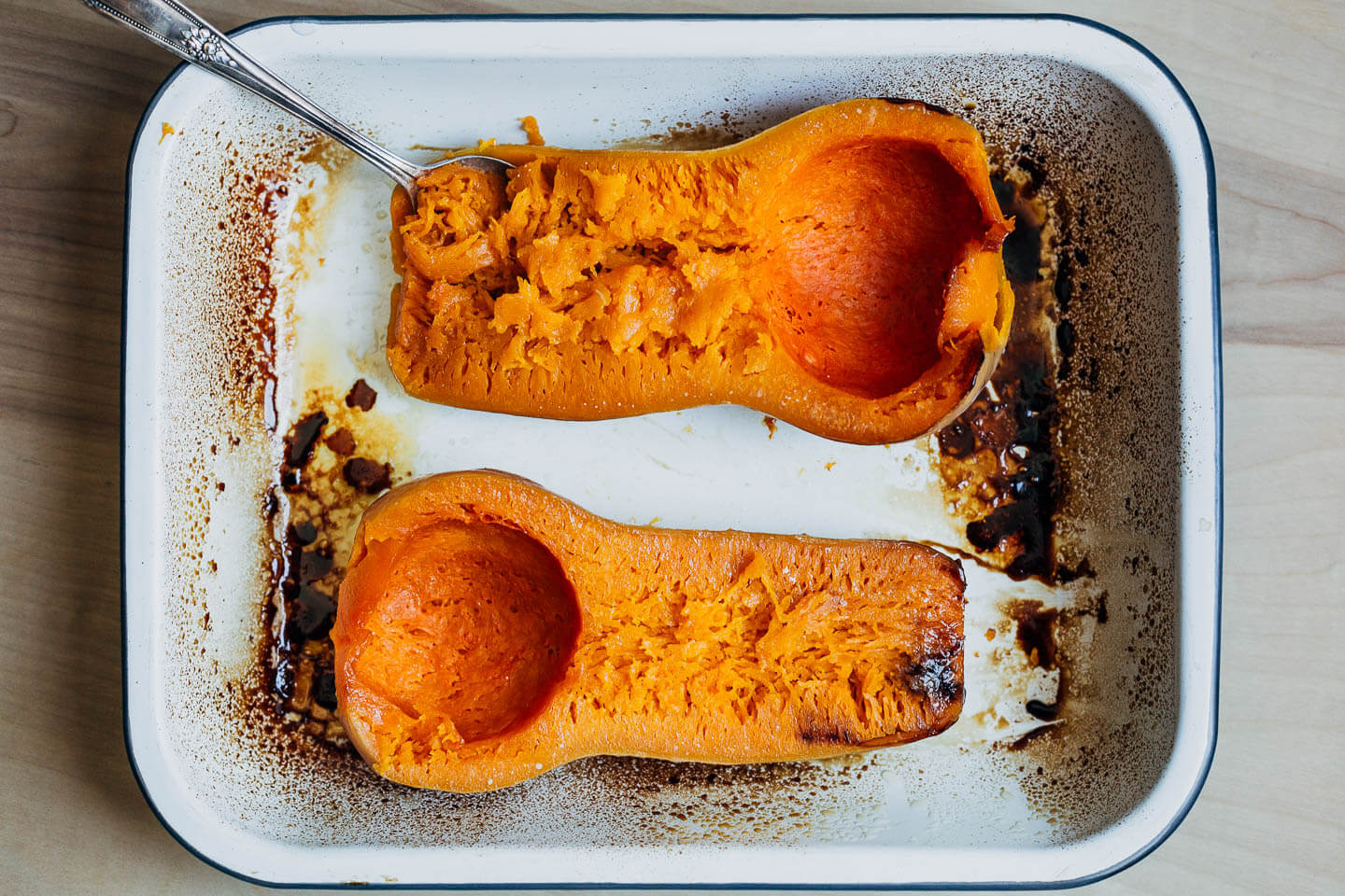 Baked butternut squash in a baking pan. 