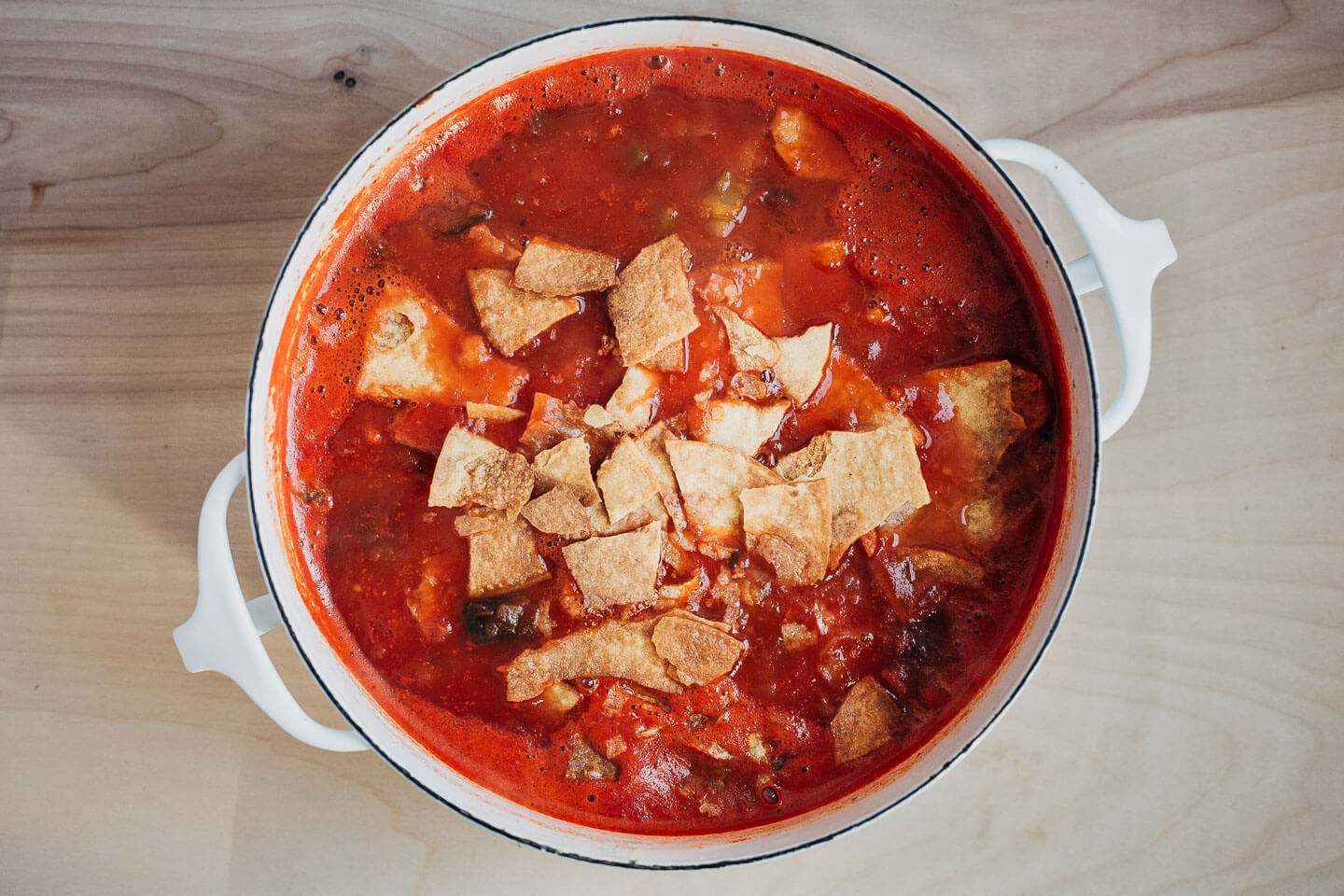 A pot of tortilla soup, before blending