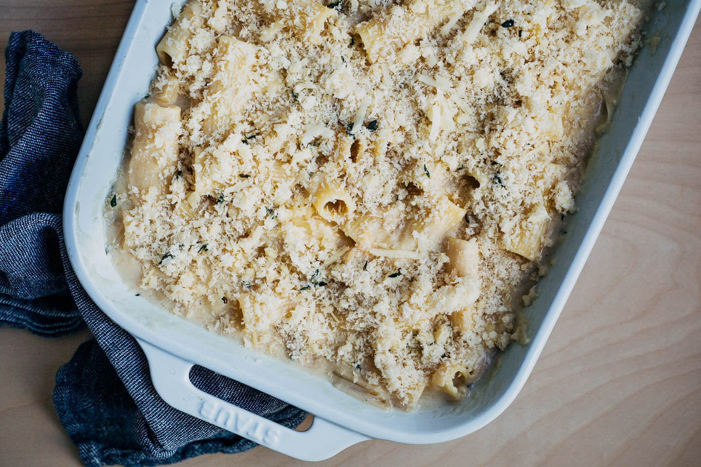 Uncooked mac and cheese in a baking dish.