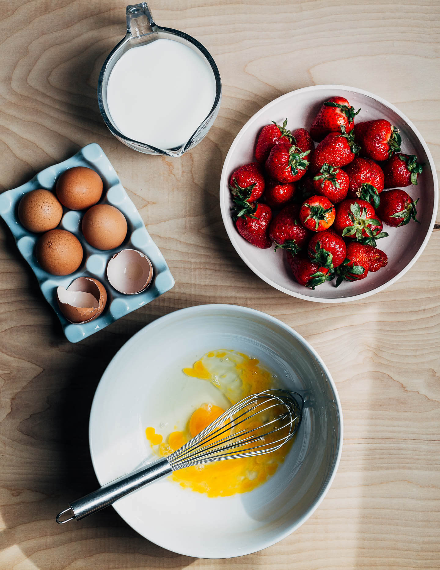 Ingredients for baked French toast on a table. 