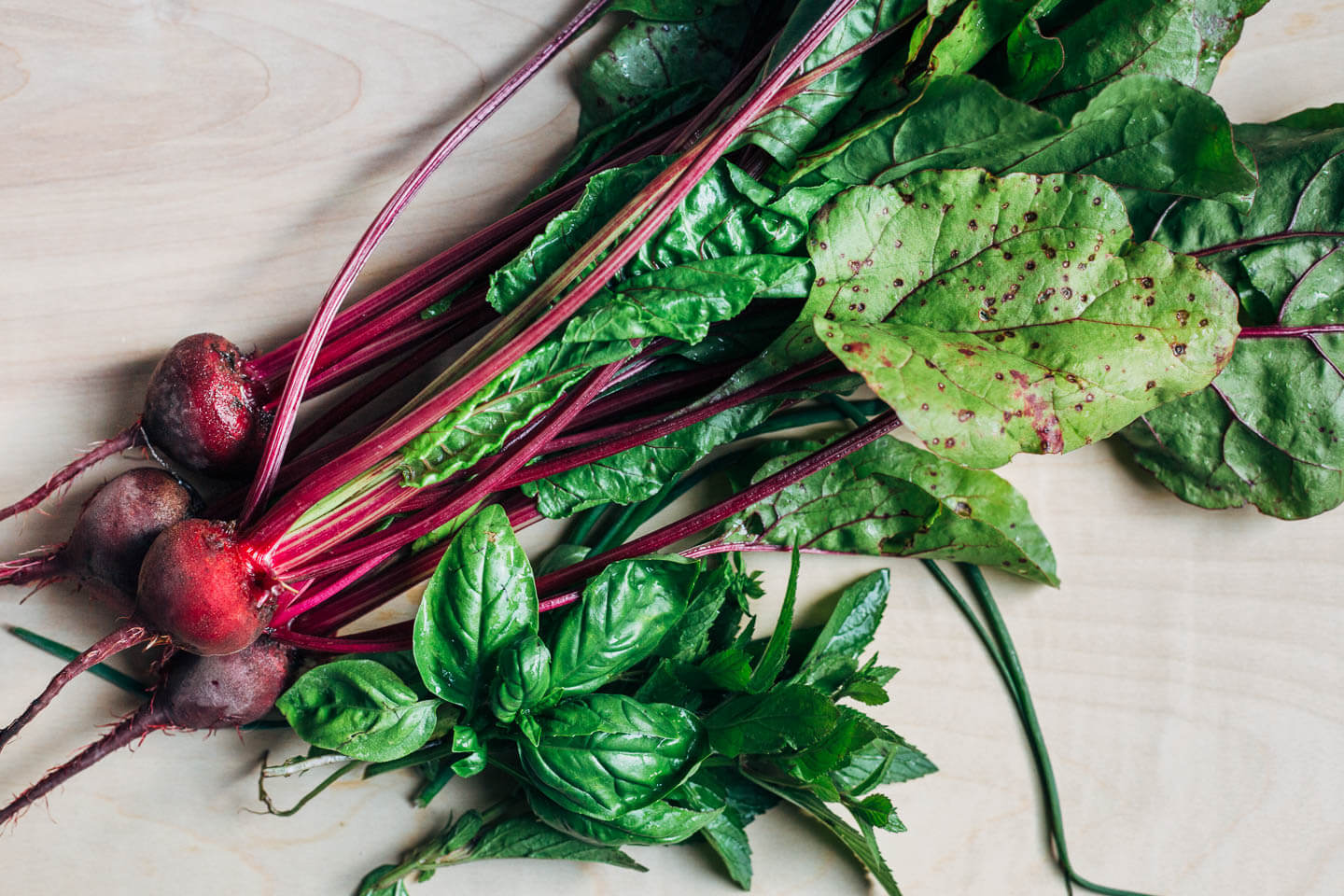 A small bunch of beets on a table